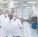식품제조공장에서 HACCP 평면도와 작업 동선을 점검하는 실무자들