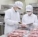 식육포장처리 작업장에서 HACCP 시범운영 기록과 제품 상태를 확인하는 모습
